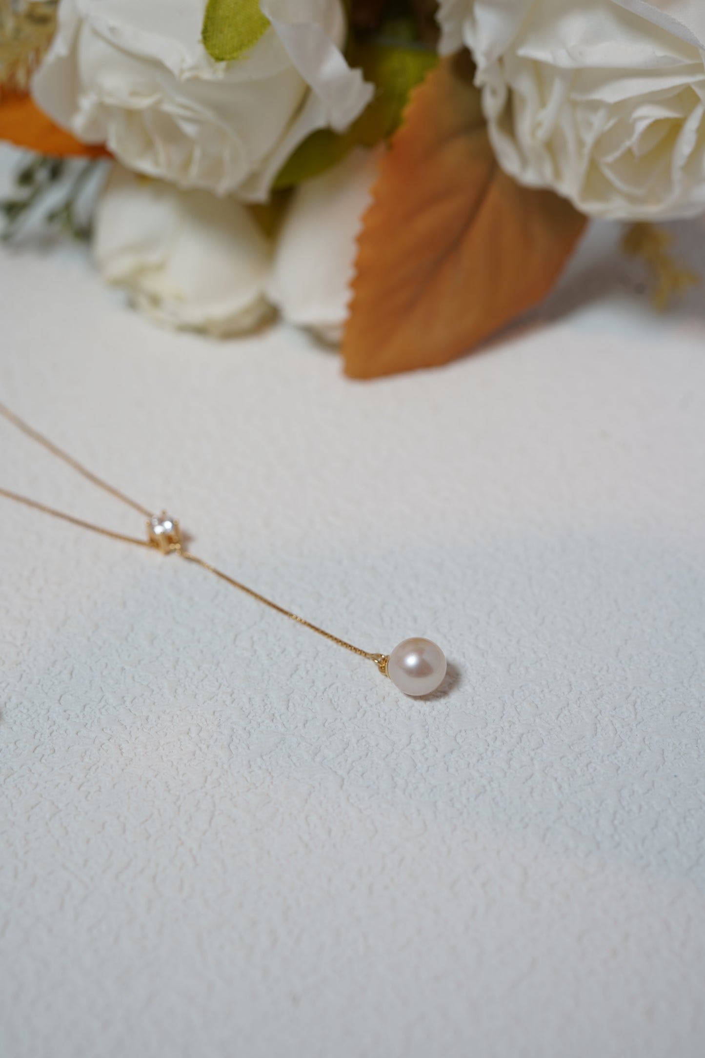 Zircon Y-shaped Round Freshwater Pearl Necklace