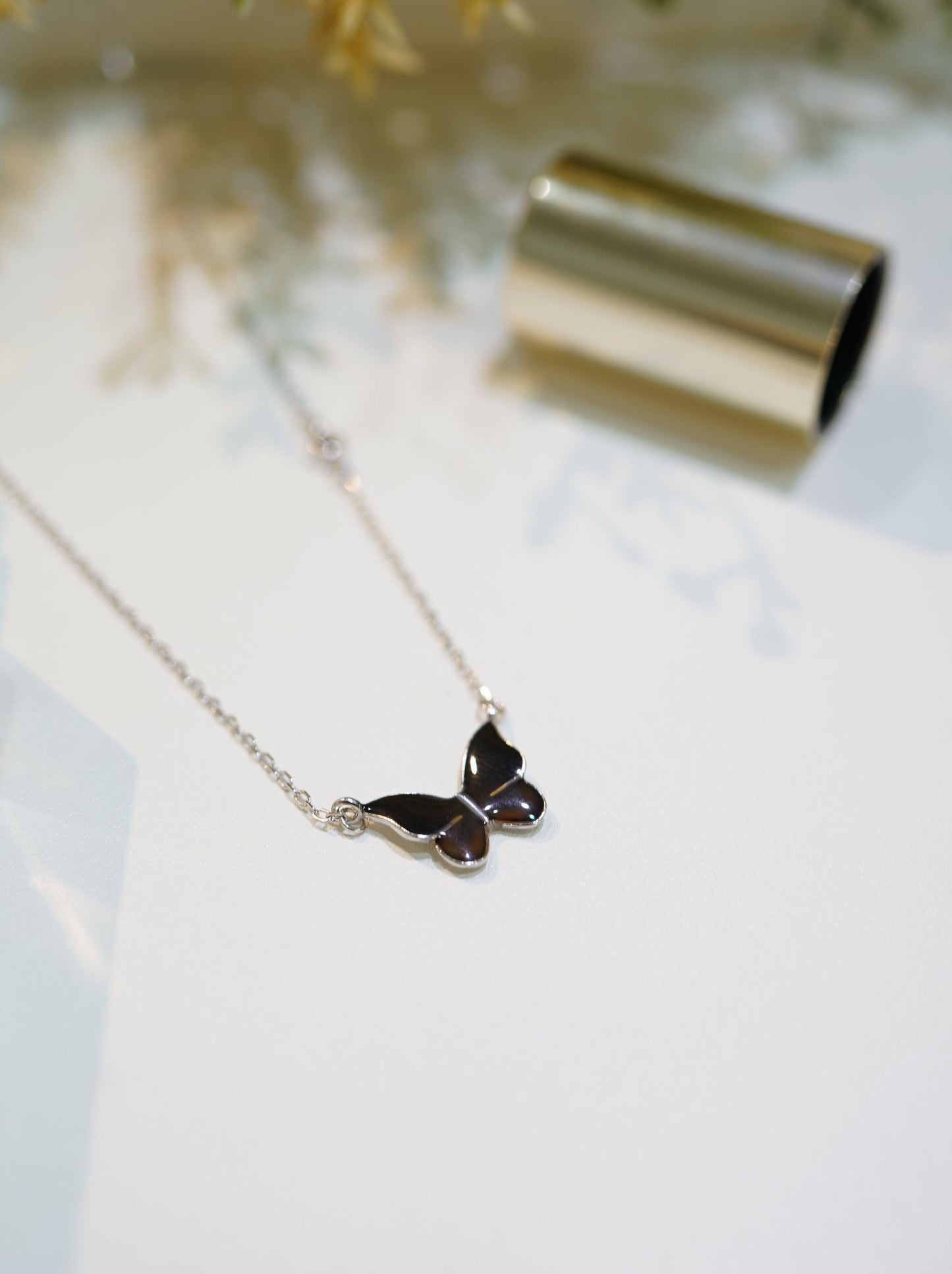 Black Discolored Butterfly Necklace